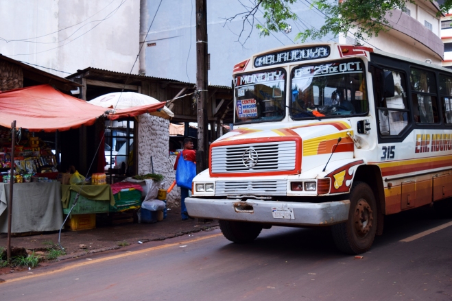 a vintage, colorfu, painted bus in ciudad del este, paraguai